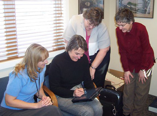 Representatives from St. Mary's and Clearwater Valley Hospitals' clinic staff met with a consultant with Qualis Health to review clinic processes in preparation for future electronic medical records. (l-r) Vicky Petersen, RN, CVHC; Helen Stroeble, RN, Qualis Health; Shari Kuther, RN; SMHC; and Pam McBride, CVHC/SMHC Meditech Project Coordinator.