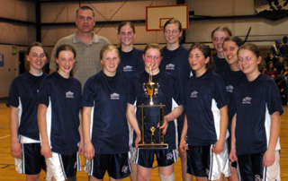 The Summit Lady Patriots with the first place trophy from the Logos Tournament.