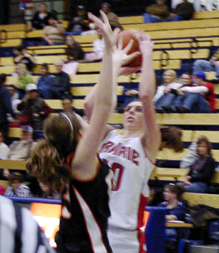 Tiffany Schaeffer puts up a jump shot against Troy.