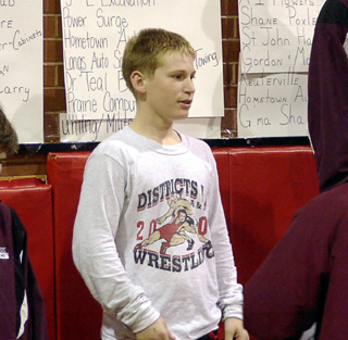 Brandon Poxleitner on the medal stand after receiving his second place medal.