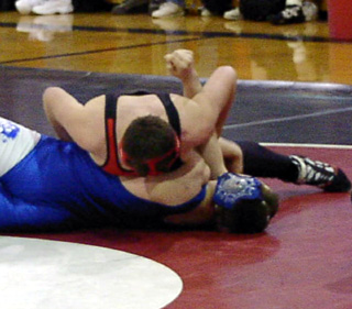 Chance Ratcliff is about to beat an Orofino wrestler to advance to the consolation finals.