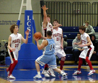 The Pirates surround the ball.