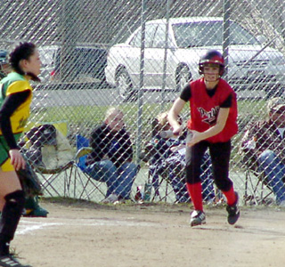 Alli Holthaus heads for first after hitting the ball against Lakeland.