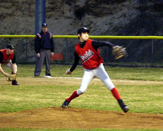 Nate Kaschmitter makes the opening pitch in the game against Potlatch.