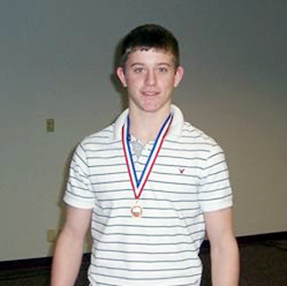 Kyle Holthaus right after being award third place in the dragster design contest.