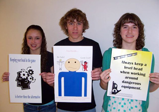 Casandra Schaeffer, Carson Heath and Alex Richardson holding the safety posters they entered in the Computer Generated Safety Poster Event at the Idaho TSA Convention.