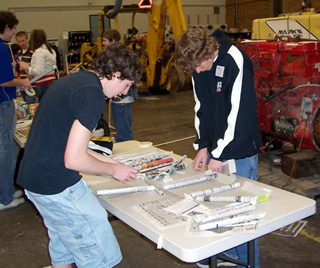 Taylor Rieman and Carson Heath in problem solving.