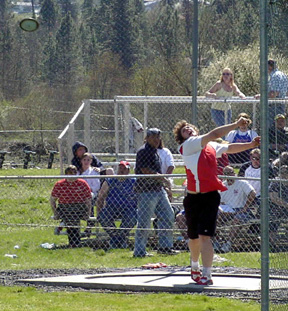 J.D. Riener tosses the discus.