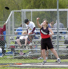 Charlene Duman tosses the discus. She placed third in the event.