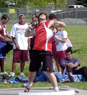 J.D. Riener puts real effort into the shot put.