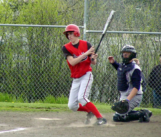 Eric Daly watches his long fly ball that went for a double against Lewis County.