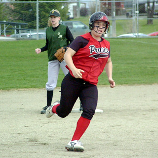 Meghan VanderPas heads for third with a first inning triple. She later scored the game's first run.