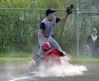 Ronnie Chandler scores after a wild pitch against Lewis County.