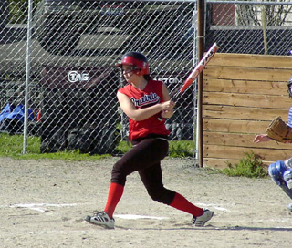 Brooke Holthaus swings the bat at Lewis County. She had 3 hits in the district game against the same team later in the week.