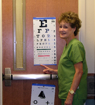 Lorraine Nuxoll, RN, shows an eye chart that will be used during this year's SMH sports physicals which are scheduled at the Nezperce Clinic for Monday, June 4; the Cottonwood Clinic, Wednesday, June 6 and the Kamiah Clinic, Monday, June 11 from 5:00 to 6:00 p.m.