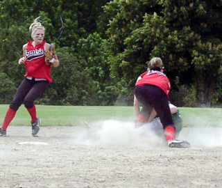 Alli Holthaus tags the Culdesac runner well short of the bag on a steal attempt as Rachel Kaschmitter backs up the play.