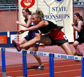 Tabitha Sonnen in the 100 hurdles prelims. She had the top qualifying time but hit a hurdle in the final and had to settle for a 4th place medal.