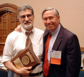 Dr. Jones, left, after being presented his award.