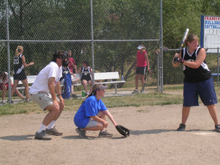 Action from the women's softball tournament.