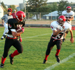 Cody Miller, 33, closes in on ballcarrier Branden Waller.