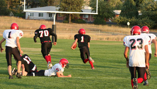 David Sigler heads for the end zone after breaking free on a long pass play.