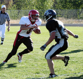 Kyle Daly jukes a defender as he gained big yardage.