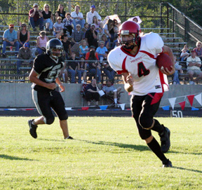 Devin Schmidt is in the open field on his way to the game's final touchdown.