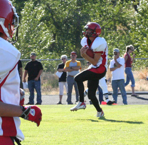 There were no defenders in sight as David Sigler catches a touchdown pass for the game's first points.