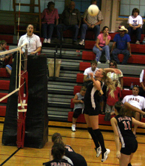 Chelsey Long spikes the ball at C.V.