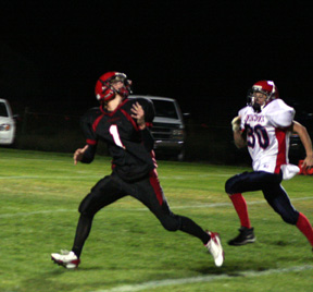 David Sigler is about to make a catch for a long gain that set up a touchdown.