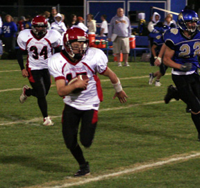 Kyle Holthaus' eyes get big as he gains yardage on a QB keeper.