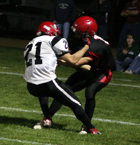 David Sigler tries to get away from a Deary defender near the goal line after a long pass.