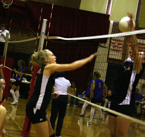 Chelsea Long spikes the ball at Gar-Pal.