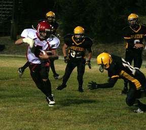 Kyle Daly jukes past a Timberline defender for his 4th TD of the game.