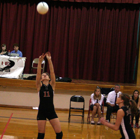 Alli Holthaus sets the ball in the Deary match.
