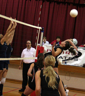 Brooke Holthaus spikes the ball against Grangeville.