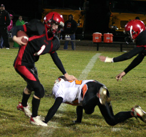 David Sigler jukes past a Troy defender on a serpentine punt return that set up a Prairie score.