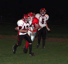 Kyle Holthaus gained good yardage on this run. #6 is Branden Waller.