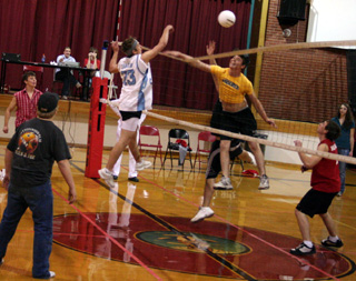 Looks like a serious net violation by Mike Mattson in the powderpuff volleyball match.