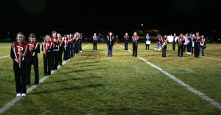 The PHS band forms into a capital P during halftime of the football game on Friday.