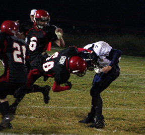 Andy Groom tackles the Lapwai quarterback for a loss.
