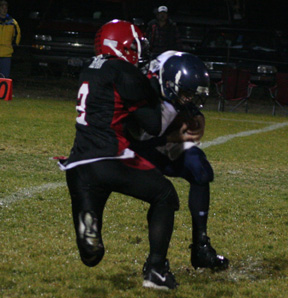 Conner Rieman sacks the Lapwai quarterback.
