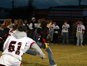 Tiffany Schaeffer runs for the game's first touchdown.