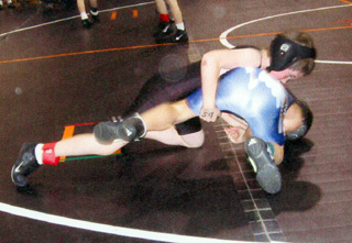 Hunter Chaffee rolls his opponent on the way to a win by pin.
