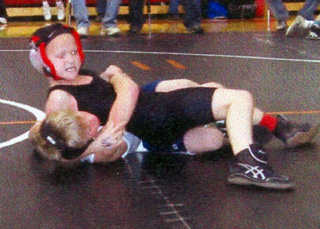 Kellie Heitman puts her all into a match on her way to a silver medal.