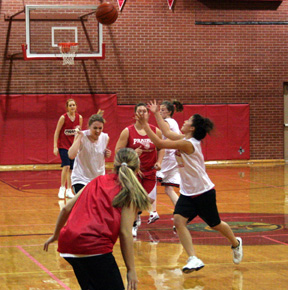 Amber Holthaus goes after a bad pass in the varsity vs. JV scrimmage.