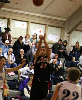 Freshman Devin Schmidt puts up a wide open shot at Grangeville.