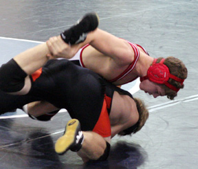 Jake Wimer scores a takedown.