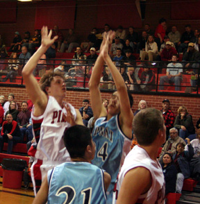 Kyle Daly puts up a shot from just inside the free throw line.