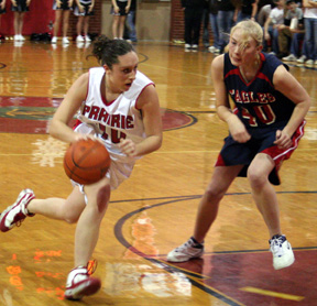 Kaylee Uhlenkott dribbles past a Lewis County defender.